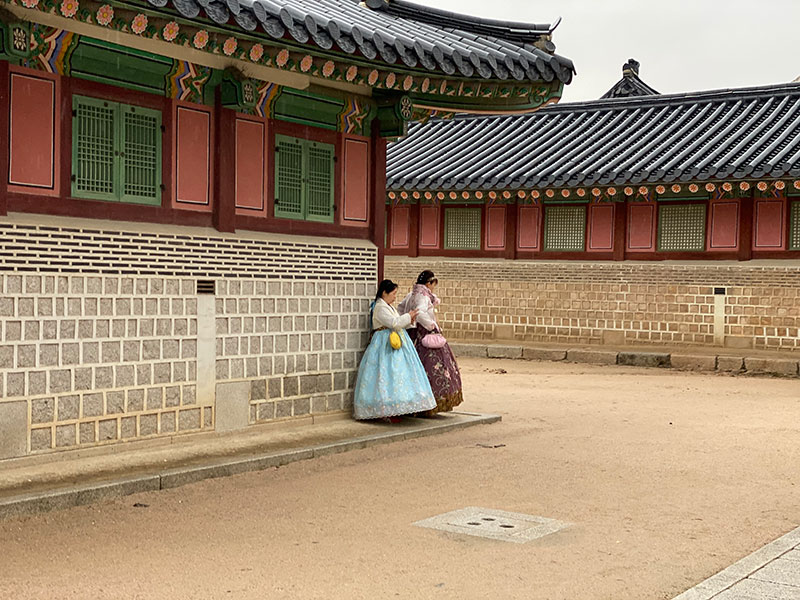 Seoul 2024 class by Cup of Excellence - photo of two women on the sidewalk